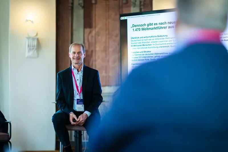 Dr. J&uuml;rgen Sturm presenting data on Germany&rsquo;s 1,470 hidden champions