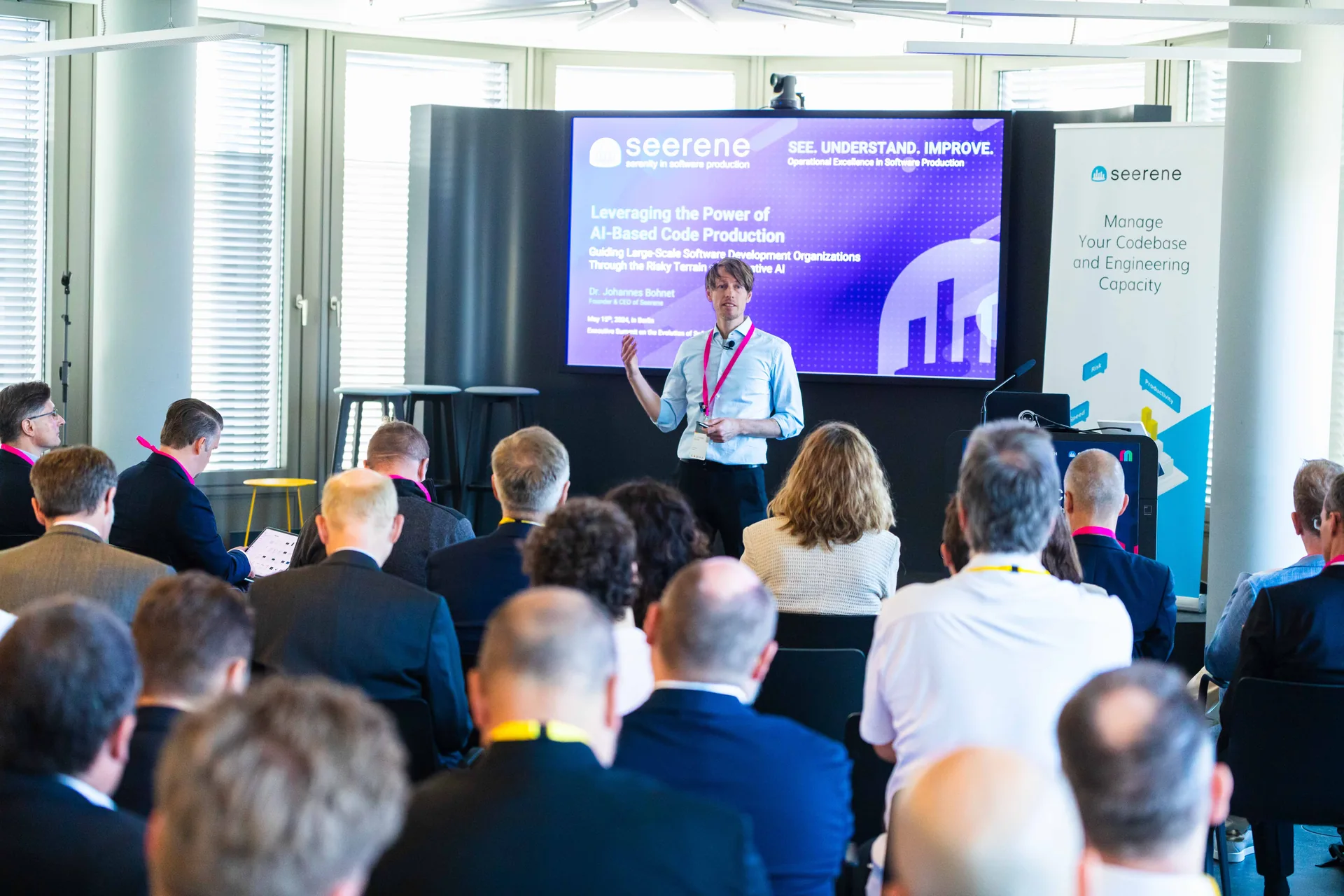 Dr. Johannes Bohnet speaking to CxOs