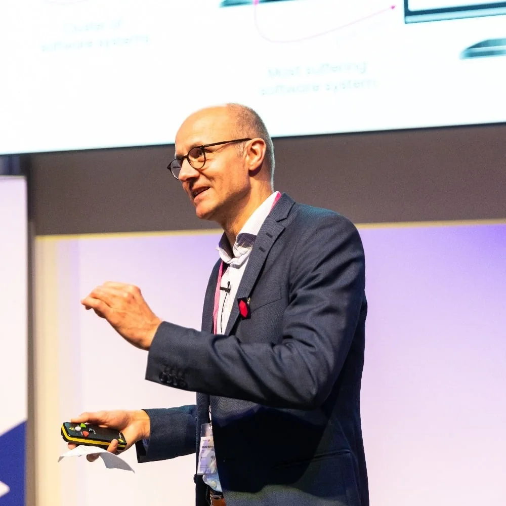 Alexander Hofmann explains how to scale software production to an audience of CXOs